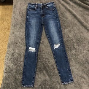 American Eagle Super high rise distressed begging